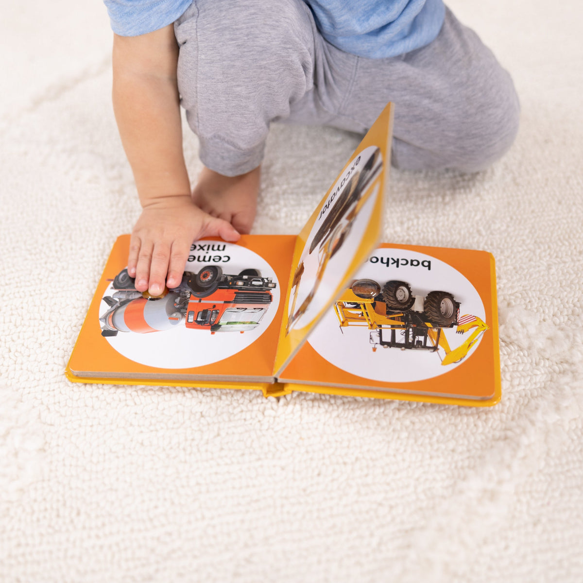 Poke-a-Dot: Construction Vehicles Board Book D8